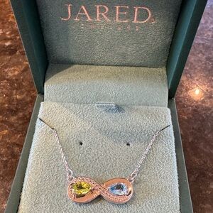 Genuine silver infinity necklace with white sapphires, perdot and blue topaz